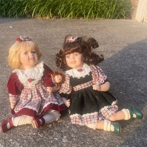 Porcelain doll sister set.